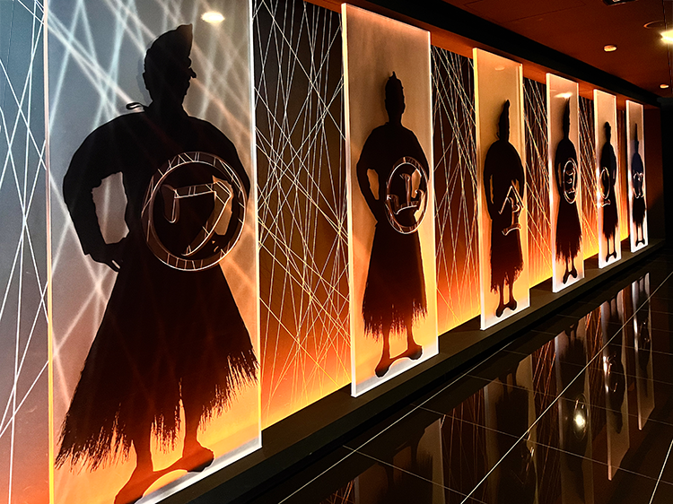 Silhouettes of cormorant fishermen are displayed at the entrance to the cormorant fishing museum. They are lined up in order of the length of their career.