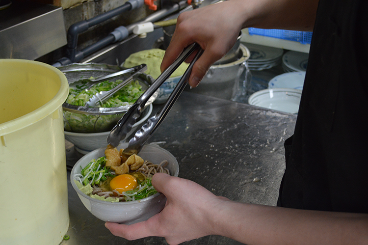 The basic chilled tanuki comes with four pieces of fried tofu (pictured is Tsukimi Soba).