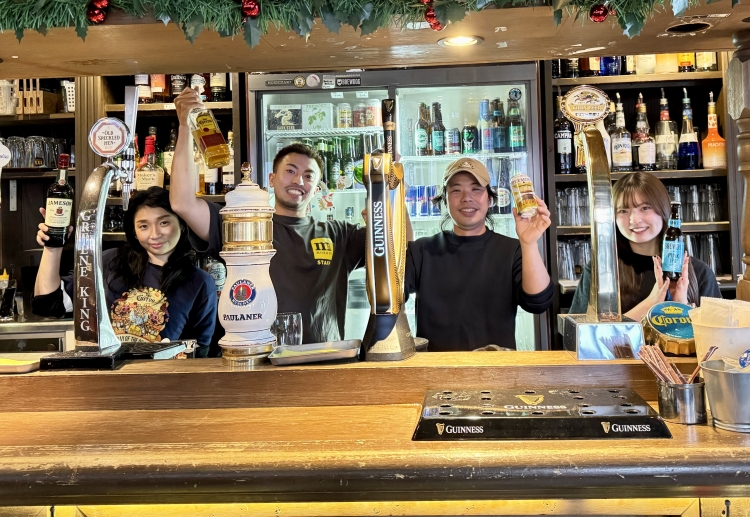 Manager Noriyuki Kaneyasu (second from the right) and his staff