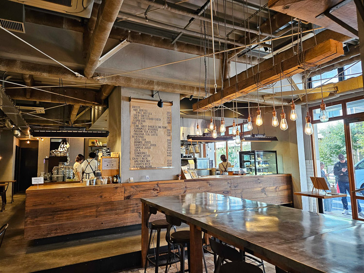The open kitchen is located in the center of the restaurant.