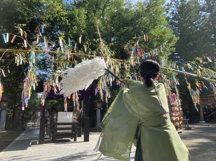 Praying at Osaki Hachiman Shrine
