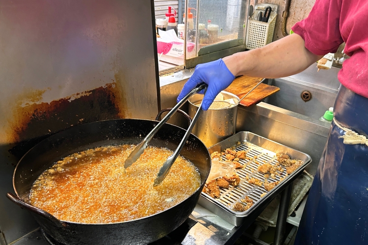 Popular prepared foods are freshly fried in store