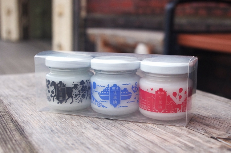 A set of three bottles of horse oil featuring illustrations related to Yokohama. Suitable for use on the face, hands, and entire body.