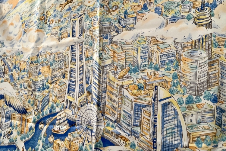A scarf featuring a sketch-style design depicting the Minato Mirai cityscape from an aerial perspective.
