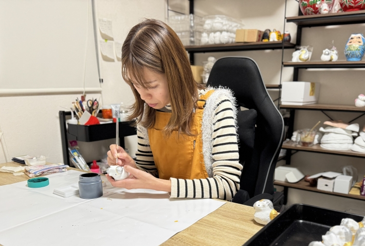 Tomoko Miura working diligently.