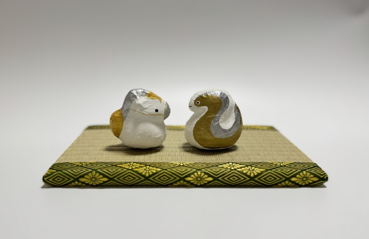 Zodiac figurines of the horse for 2025 and the snake for 2026