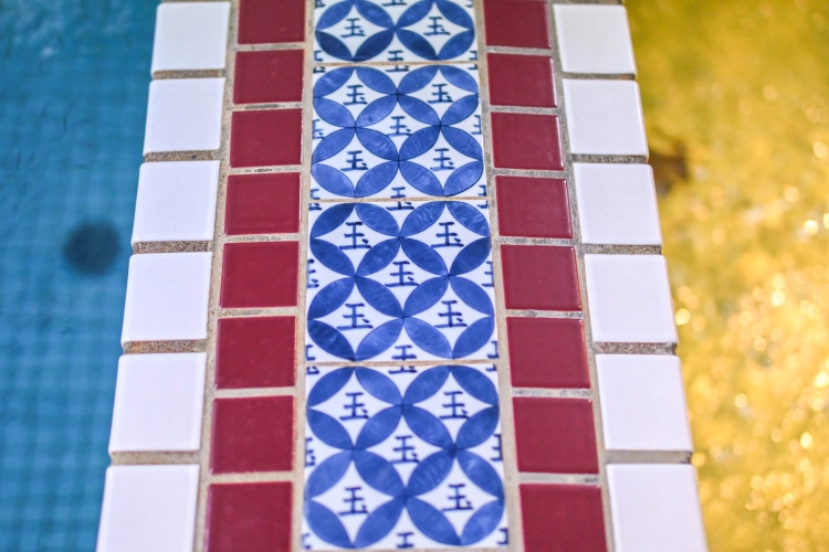 The tiles, featuring the character "玉" (tama), were designed from scratch by Harumi and are quite striking.
