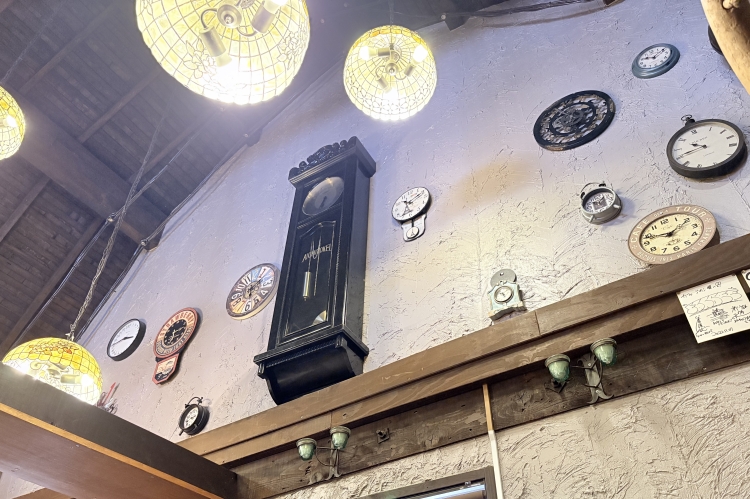The antique clocks adorning the entire wall were inherited from the old store.