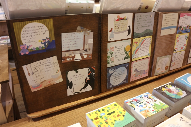 The staff's favorite notepads are also on display, conveying how art is integrated into everyday life.