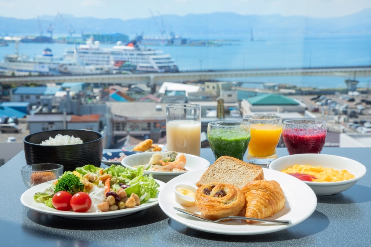 Breakfast venue (10th floor restaurant) at Resol Hakodate, offering a panoramic view of Hakodate Port.