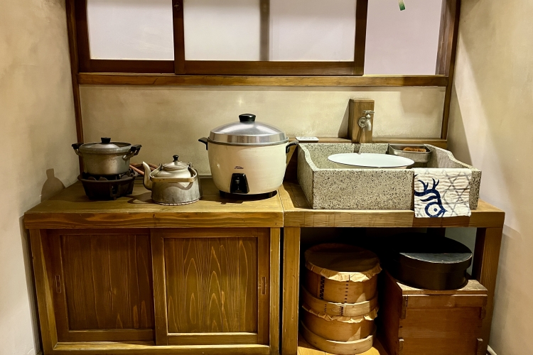 A recreated kitchen from the 1950s. A mix of old and new household items can be seen.