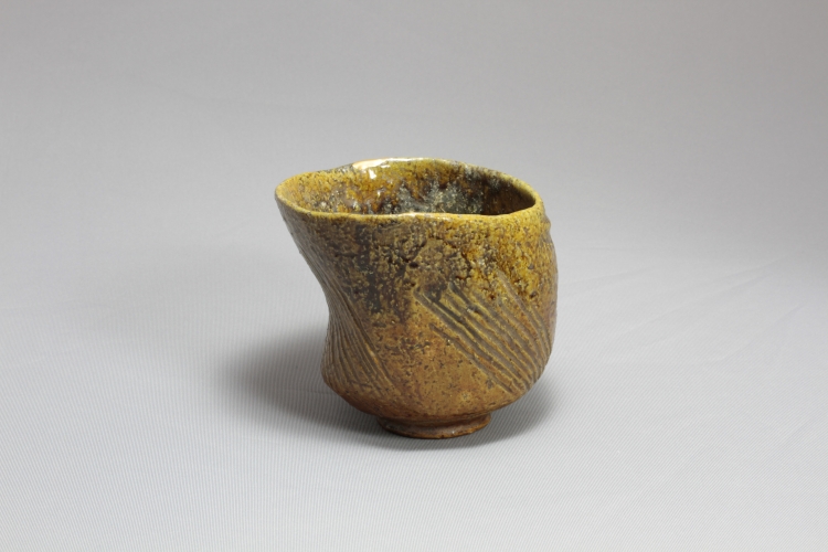 "Ohi Amber Glazed Sacred Tea Bowl" by the first Ohi Chozaemon (Edo period) © Ohi Museum
